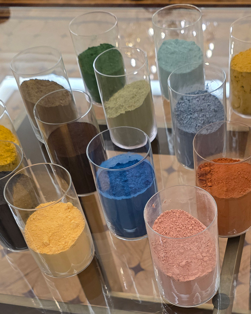 Boglioli Fall 2026 Menswear Presentation - Pigment Powders in Glass Beakers on a Table
