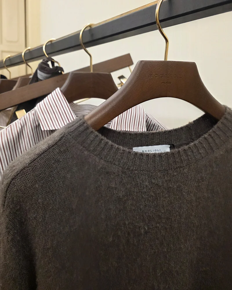 A sweater and a striped shirt