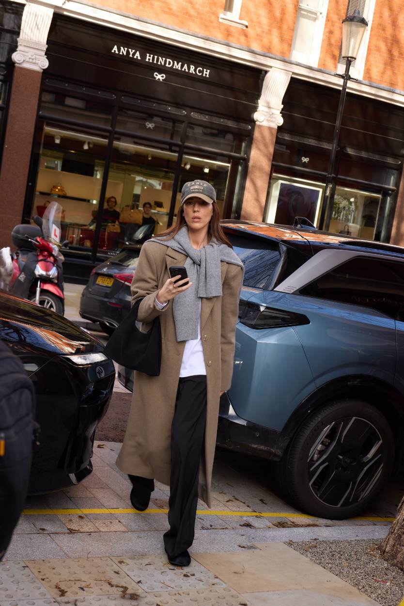 The Most Popular Fall 2026 Street Style Hats: Emilia Wickstead Fall 2026 [London] Photo: Romina Introini | Courtesy of British Fashion Council