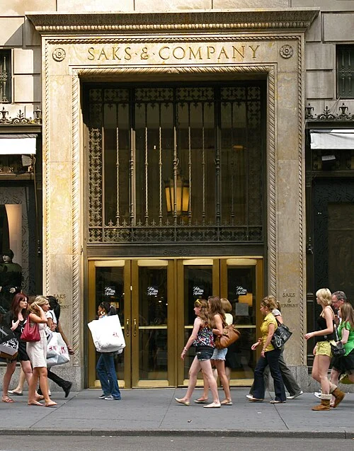 "Saks Fifth Avenue Store" by annulla, licensed under Creative Commons Attribution-Share Alike 2.0 Generic. Via Wikimeda.