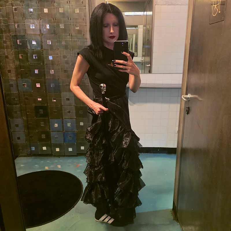 My outfit for day 1 of Olfactory Signals: a black frilled maxi skirt, boxing shoes, and a tank top