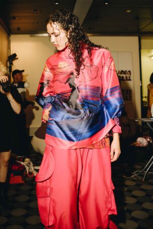 8/69 | Orange Culture Spring 2027 Backstage | Photo: Dominik Odenkirchen | Courtesy of Berlin Fashion Week Orange Culture Spring 2027 Backstage | Photo: Dominik Odenkirchen | Courtesy of Berlin Fashion Week