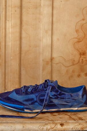 1/11 | Hed Mayner x Aro Sneaker Collaboration at Hed Mayner Spring 2027 Menswear | Courtesy of Hed Mayner Hed Mayner x Aro Sneaker Collaboration at Hed Mayner Spring 2027 Menswear | Courtesy of Hed Mayner