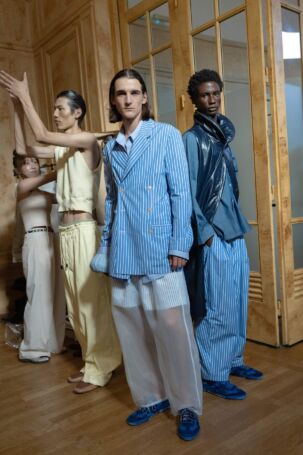 2/11 | Hed Mayner x Aro Sneaker Collaboration at Hed Mayner Spring 2027 Menswear | Courtesy of Hed Mayner Hed Mayner x Aro Sneaker Collaboration at Hed Mayner Spring 2027 Menswear | Courtesy of Hed Mayner