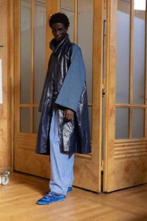 7/11 | Hed Mayner x Aro Sneaker Collaboration at Hed Mayner Spring 2027 Menswear | Courtesy of Hed Mayner Hed Mayner x Aro Sneaker Collaboration at Hed Mayner Spring 2027 Menswear | Courtesy of Hed Mayner