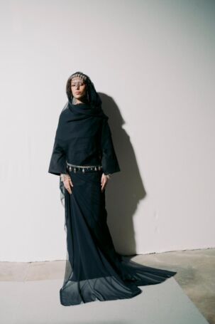 1/11 | Kazna Asker Fall 2025 | Photo: Sandra Nagel | Courtesy of Kazna Asker Kazna Asker Fall 2025 | Photo: Sandra Nagel | Courtesy of Kazna Asker