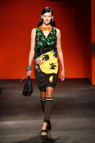 1/40 | Prada Spring 2014 | Photo: NOWFASHION.com Prada Spring 2014 | Photo: NOWFASHION.com